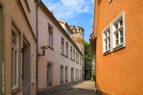 A narrow alley with tower of the former city wall Coburg - Germany © Ina Meer Sommer