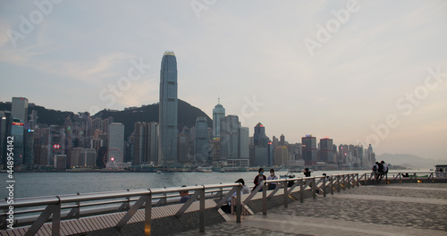 Hong Kong city at sunset, Victoria harbor promenade