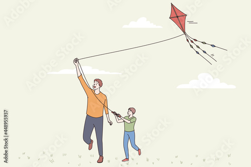 Happy fathers day and leisure concept. Smiling positive man parent dad and his son playing with flying kite together outdoors on sunny summer day vector illustration 