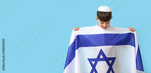Little boy with the flag of...