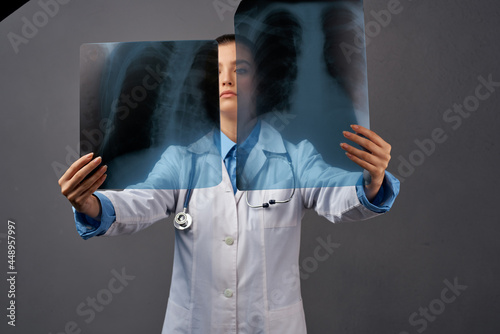 Woman in white coat radiologist professional