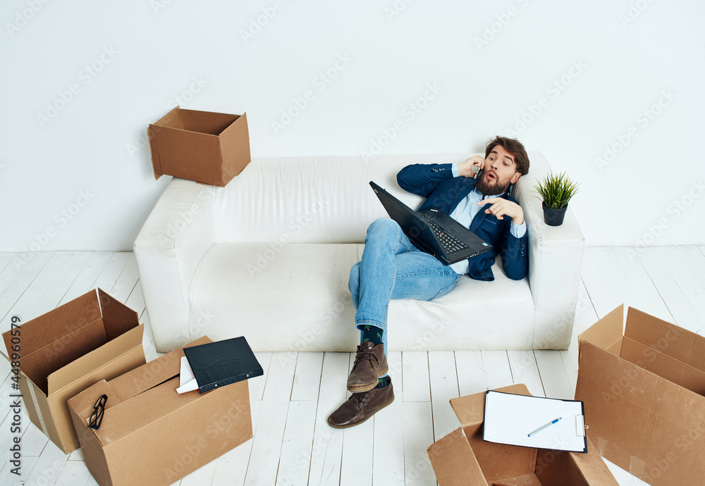 manager with boxes new place of work unpacking relocation manager with boxes new place of work unpacking relocation