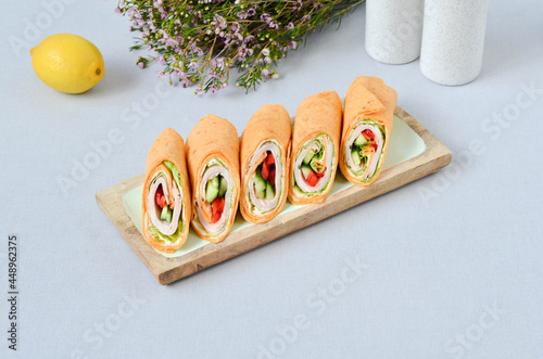 A set of beautiful canapes on a table with a gray tablecloth. Buffet table. Catering