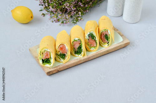 A set of beautiful canapes on a table with a gray tablecloth. Buffet table. Catering