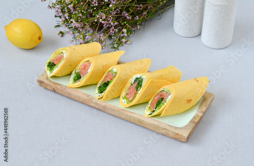 A set of beautiful canapes on a table with a gray tablecloth. Buffet table. Catering