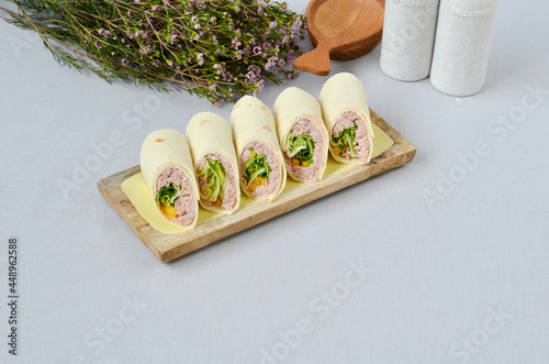 A set of beautiful canapes on a table with a gray tablecloth. Buffet table. Catering