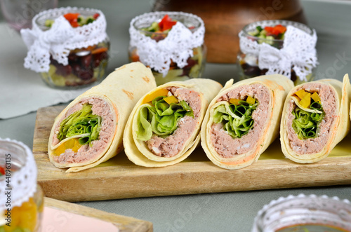 A set of beautiful canapes on a table with a gray tablecloth. Buffet table. Catering
