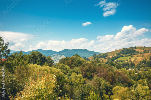 View of the slopes of mountains during sunset in summer