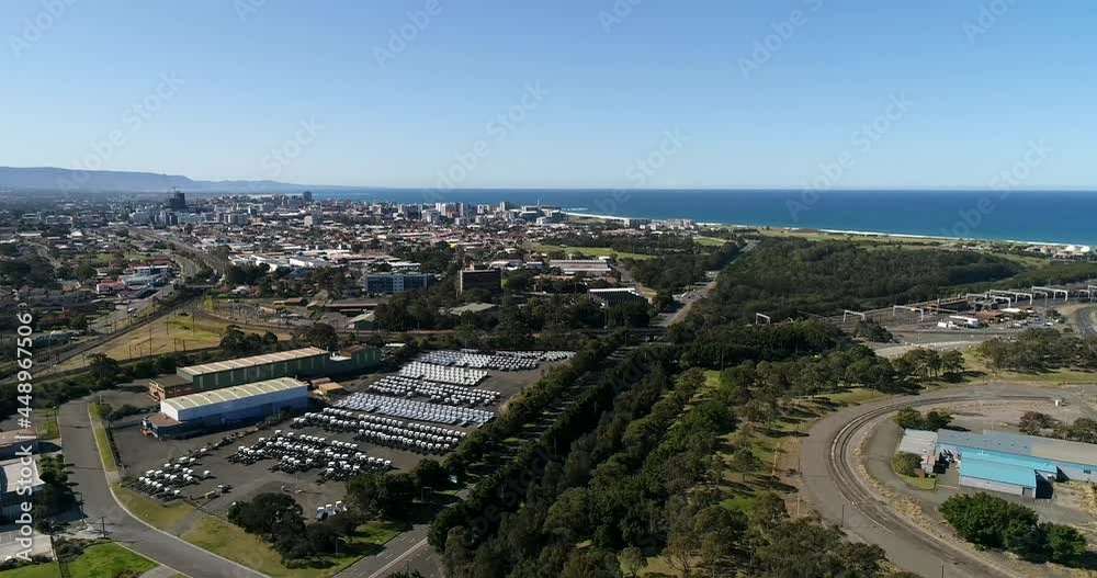 Panorama of Port Kembla industrial gate of Australia, NSW – aerial 4k.
Panorama of Port Kembla industrial gate of Australia, NSW – aerial 4k.
