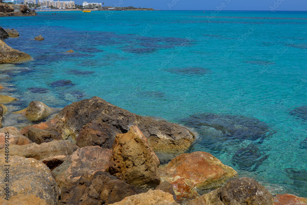 Sea shore. Rocky shore. Rest at the sea. Vacation. Beach. Cyprus.