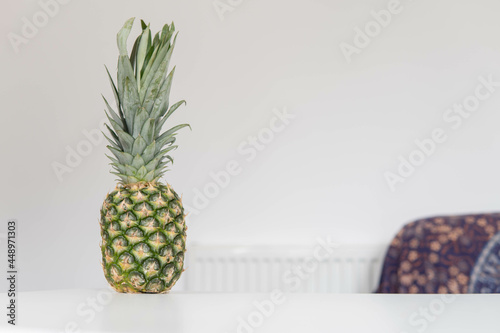 Obraz na płótnie Fresh ripe pineapple fruit, pineapple fruit slices isolated. Juicy fruit design elements composition with focus stacking, white background. Tasty raw whole tropical fruit, healthy nutrition concept
w salonie