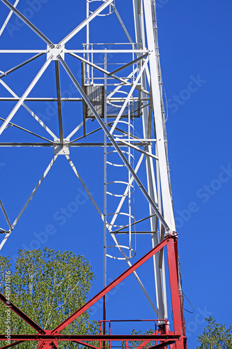 A fragment of a metal structure of a cellular communication tower