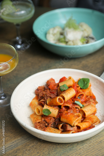 Pasta with braised duck and tomatoes