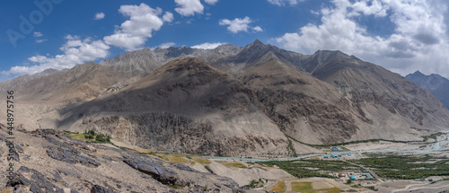 Panoramic view on the Wakhan Corridor overlooking the Pamir river valley bordering Afghanistan, near Langar, Gorno-Badakshan, the Tajikistan Pamir photo