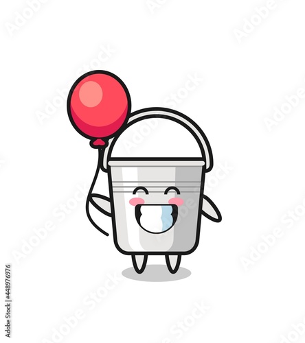 metal bucket mascot illustration is playing balloon