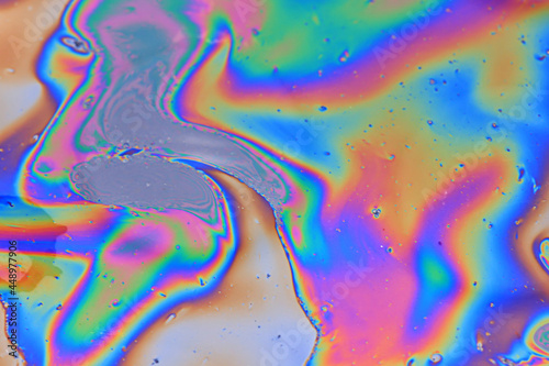 Photos multicolored spot gasoline abstract background, abstract oil spill on water