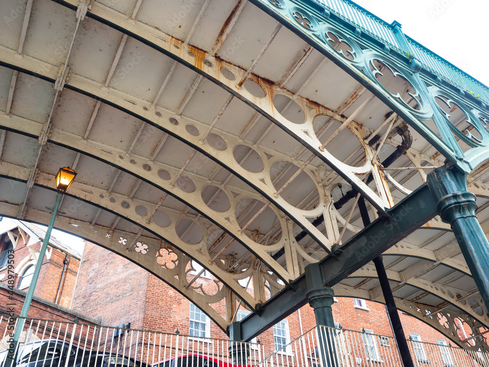 Support struts and posts underneath an old cast iron bridge built in 1834