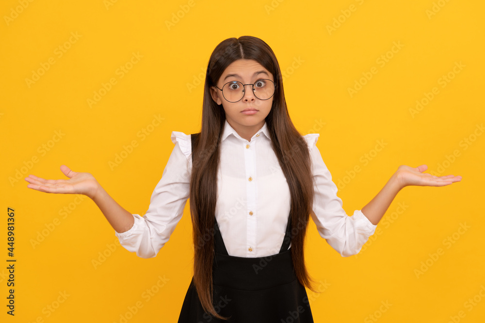 confused child long hair look like nerd. smart kid. girl look through eyeglasses. vision acuity confused child long hair look like nerd. smart kid. girl look through eyeglasses. vision acuity