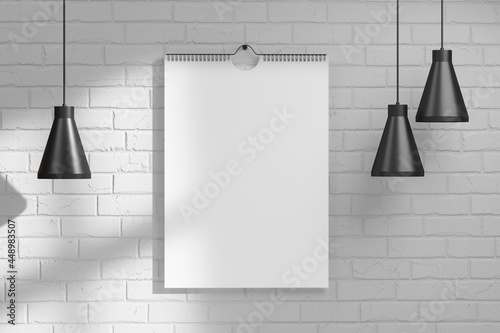 blank calendar on the wall. large paper sheet hanging calendar poster on wall, mockup for calendar design presentation in interior