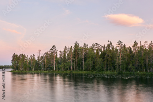 nordic sunset for postcards in finland during summer evening and twilight colors in sky with clouds in lapland finland carbon sink background corporate annual report marketing