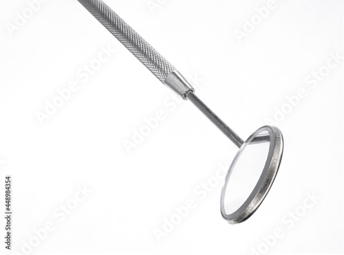 Dental instrument tool on white background.