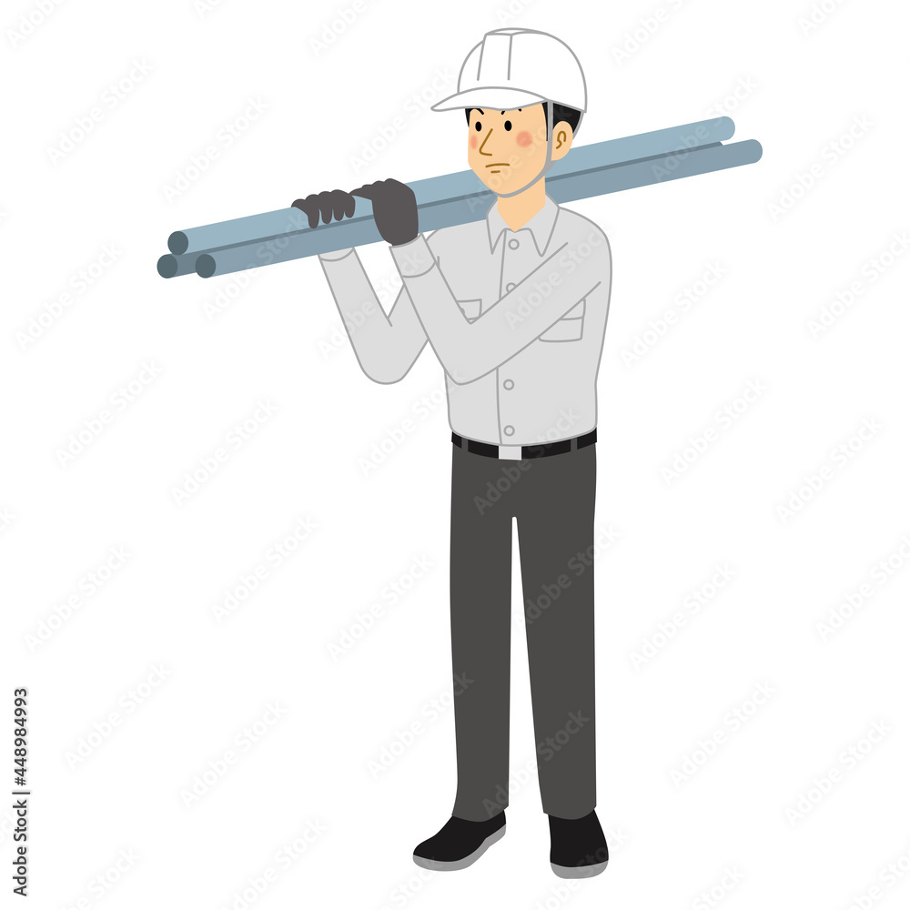 鉄パイプを運ぶ工事現場の男性