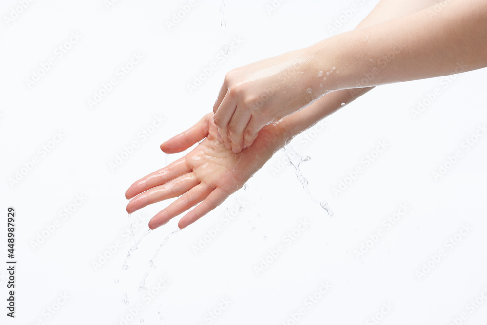 Fototapeta premium women washing hands on white background.