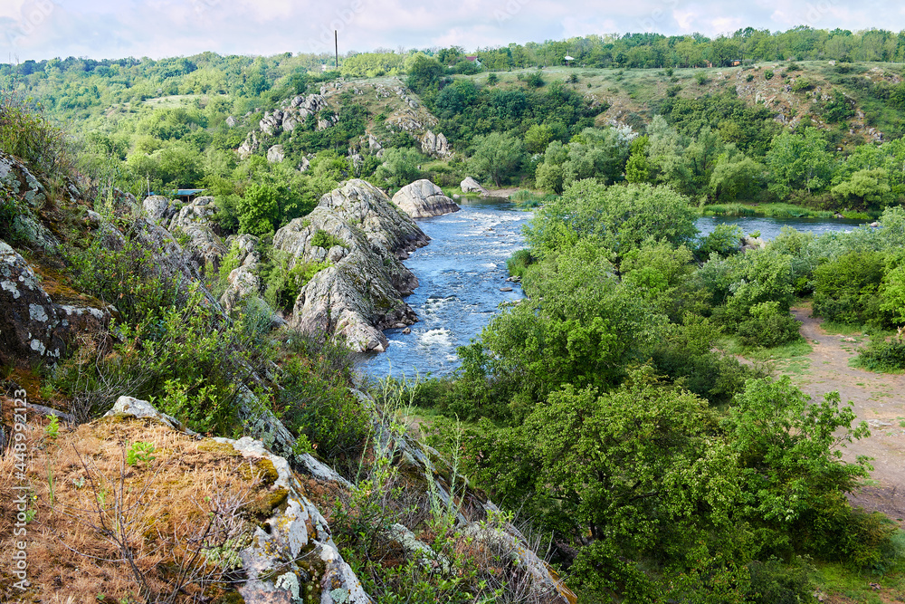 The view on Southern Bug river in in bug Guard national nature park with Integral water rapids at spring in Migeya, Mykolaiv Region, Ukraine.