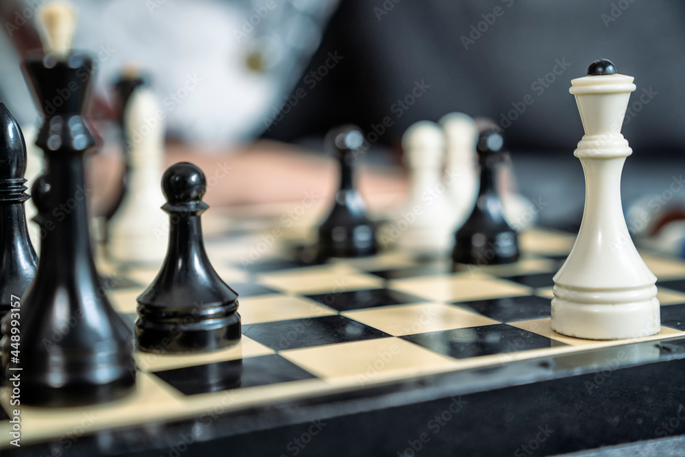 Play chess. Chess pieces on the board. Intellectual game Play chess. Chess pieces on the board. Intellectual game