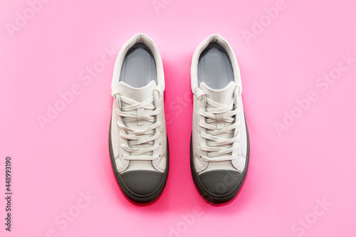 Antalya, Turkey, July 23, 2021. Men's white sports sneakers with gray soles