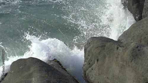 A Baker beach in San Francisco and slow motion of splashing waves photo