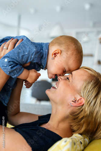 Happy mother with adorable toddler child. Family  parenting  childhood concept.