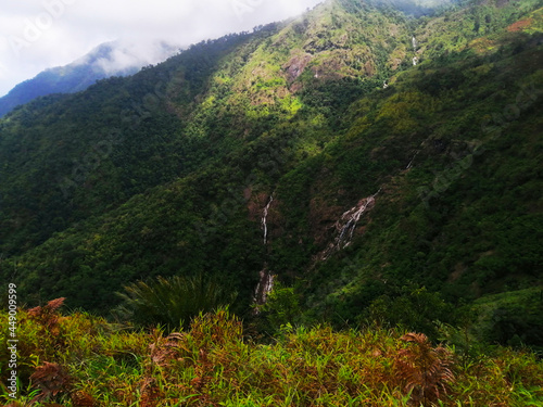 Top view of Pe To Lo Su Waterfall look like Heart Shaped at the top of mountain with green forest  in Umphang, Tak Province, Thailand.