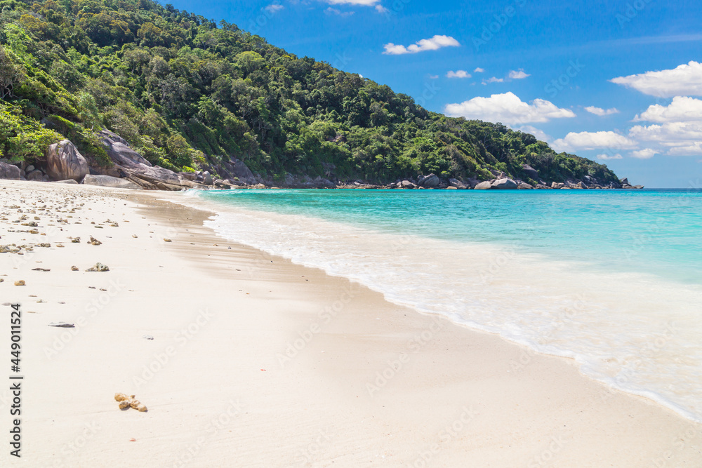 Beautiful sandy beach with wave crashing on sandy shore at Similan Islands. Beautiful sandy beach with wave crashing on sandy shore at Similan Islands.
