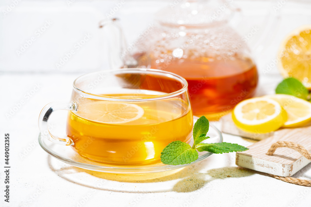 healthy tea for immunity with ginger, lemon and mint, closeup healthy tea for immunity with ginger, lemon and mint, closeup