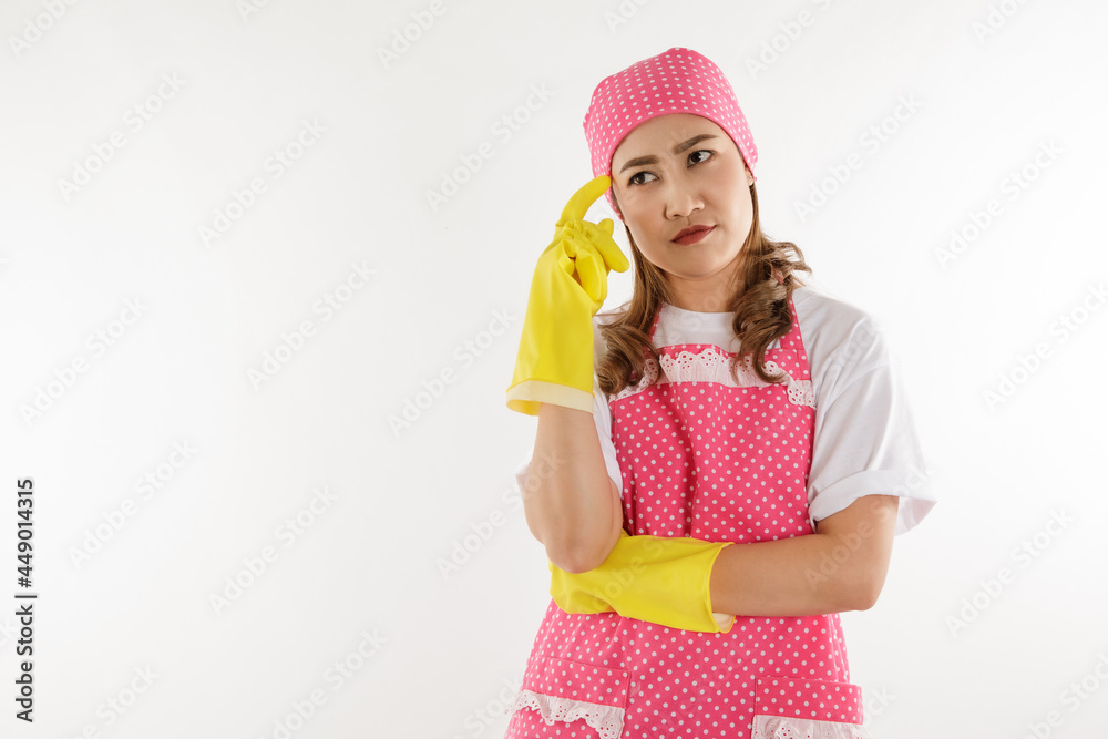 Portrait of young maid wearing yellow grove on white background. Portrait of young maid wearing yellow grove on white background.