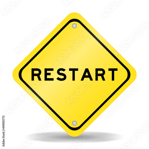 Yellow color transportation sign with word restart on white background