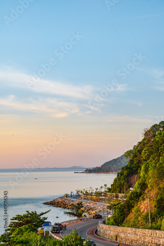 Fototapeta Naklejka Na Ścianę i Meble -  chanthaburi,thailand-28 nov 2020:Beautiful seascape view with the mountain and sunset at noen nangphaya viewpoint chanthaburi thailand.