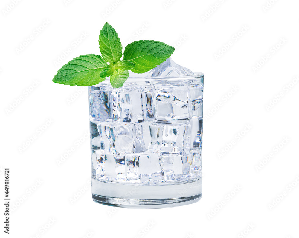 Glass of ice cubes cold water with fresh mint leaves for drink in summer. Glass of ice cubes cold water with fresh mint leaves for drink in summer.