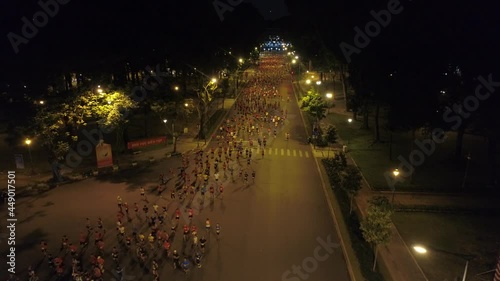 November 2019. Aerial view of people running on Saigon street at the marathon event in Ho Chi Minh city photo