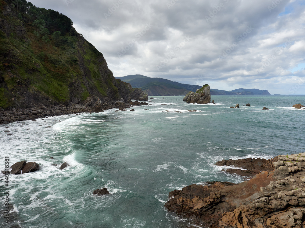 Steep coastline in the Basque Country area on a cloudy day