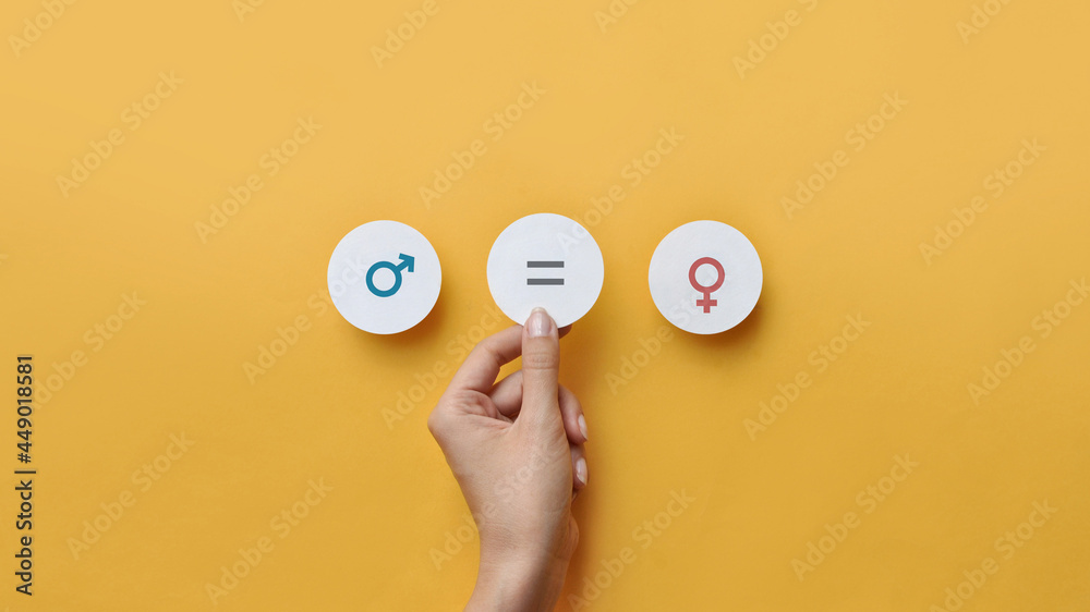 Paper circles with the icons men and women Equality between men and ...