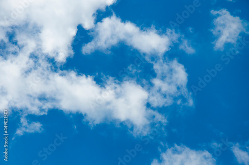 blue sky with large beautiful air clouds floating in weightlessness. High quality photo