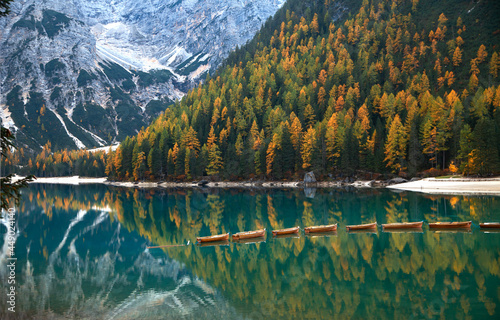 Boats on Braies lake. Lago di Braies (Pragser Wildsee) is a wild lake in the Dolomites in South Tyrol, Italy.