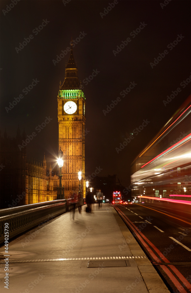 Palace of Westminster and Elizabeth Tower at dusk with light tracks, London, UK