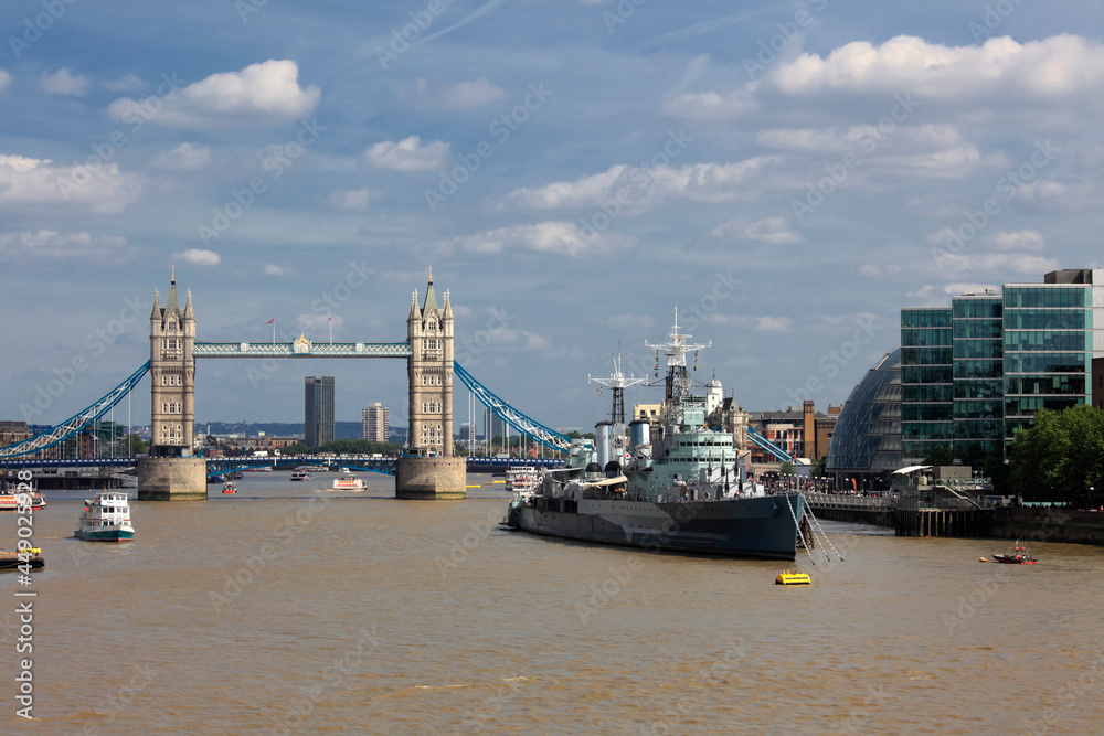 HMS Belfast (C35) and Tower bridge, London, UK