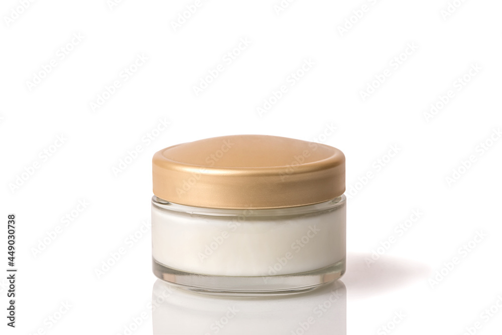 Cosmetic cream in a white jar. On a white isolated background. Cosmetic cream in a white jar. On a white isolated background.