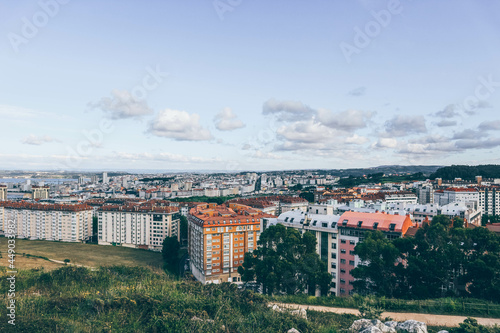 View of colorful buildings in A Coruña city from hill 