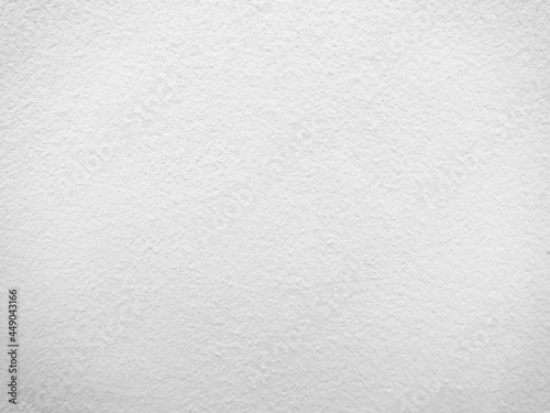 Abstract background of white cement plaster wall texture, detail of concrete surface, stucco, wallpaper. Can be used for the winter card background and have copy space for text.