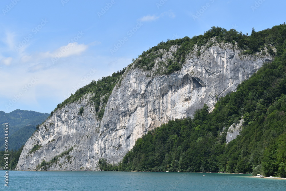 A Sankt Gilgen am Wolfgangsee with a mountain in the background
